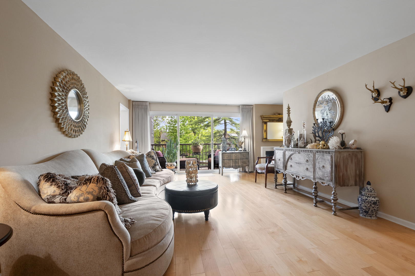 44 Park Lane, Unit 223 Park Ridge, IL 60068 - Photo 2 of 28 a living room with furniture and a large window