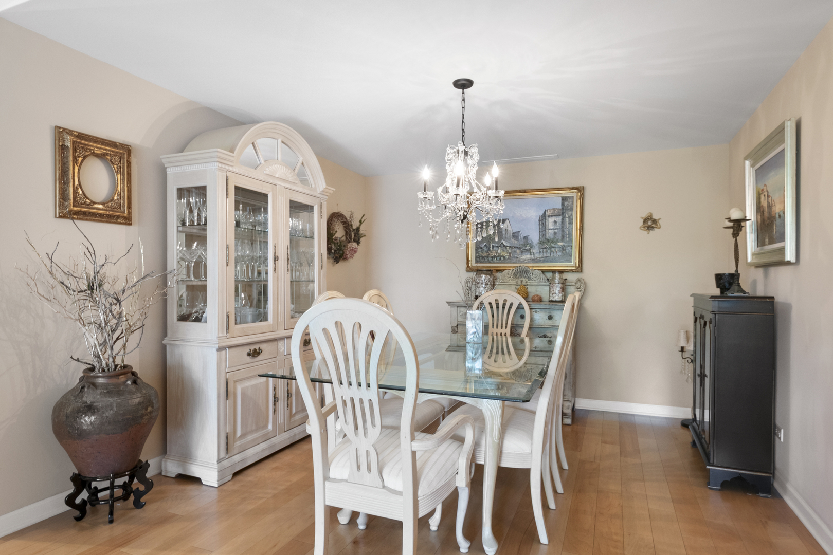 44 Park Lane, Unit 223 Park Ridge, IL 60068 - Photo 5 of 28 a view of a dining room with furniture and wooden floor