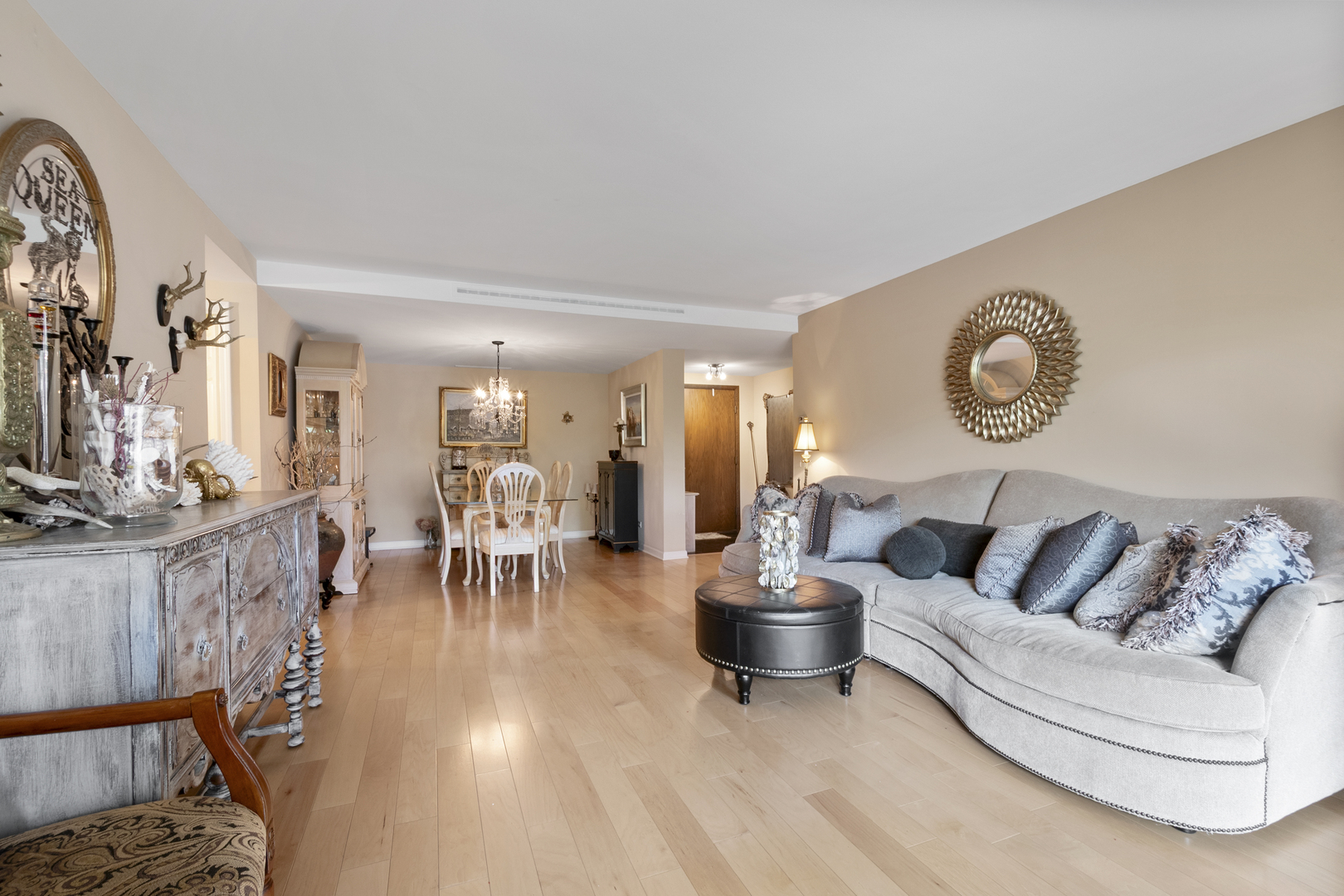 44 Park Lane, Unit 223 Park Ridge, IL 60068 - Photo 8 of 28 a living room with furniture and a wooden floor