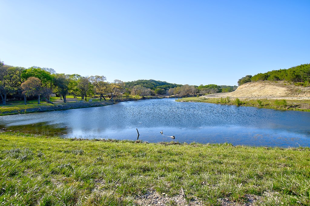 109 Hubble Lane Kerrville, TX 78028 - Photo 7 of 22 a view of lake with mountain in the background