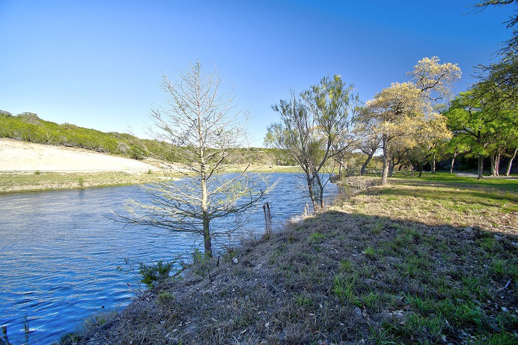 109 Hubble Lane Kerrville, TX 78028 - Photo 10 of 22 a view of a backyard with large trees