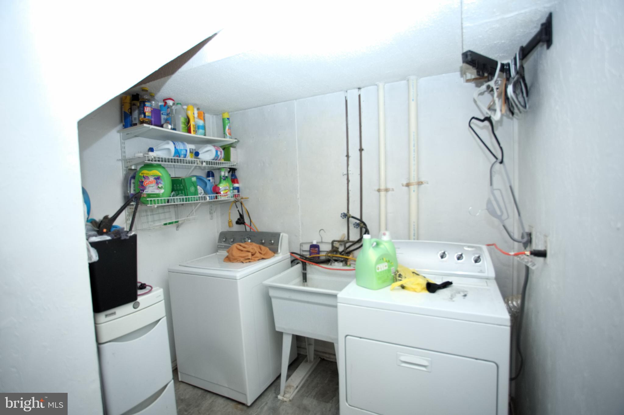 542 Chisholm Trail Lusby, MD 20657 - Photo 12 of 29 a room with storage and utility