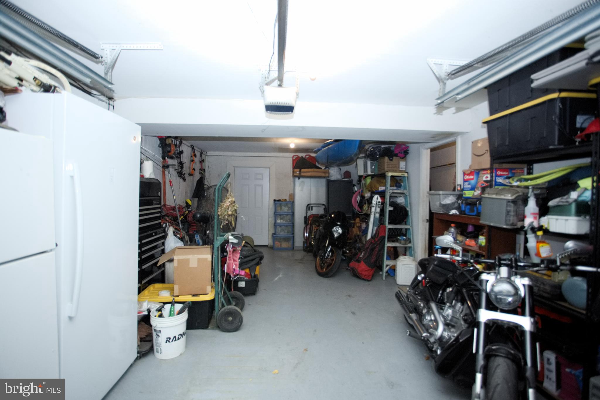 542 Chisholm Trail Lusby, MD 20657 - Photo 14 of 29 a view of a room with gym equipment