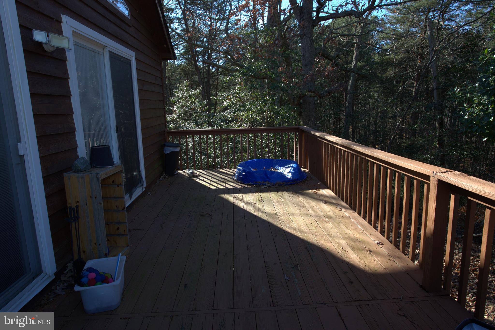 542 Chisholm Trail Lusby, MD 20657 - Photo 28 of 29 a terrace with outdoor seating