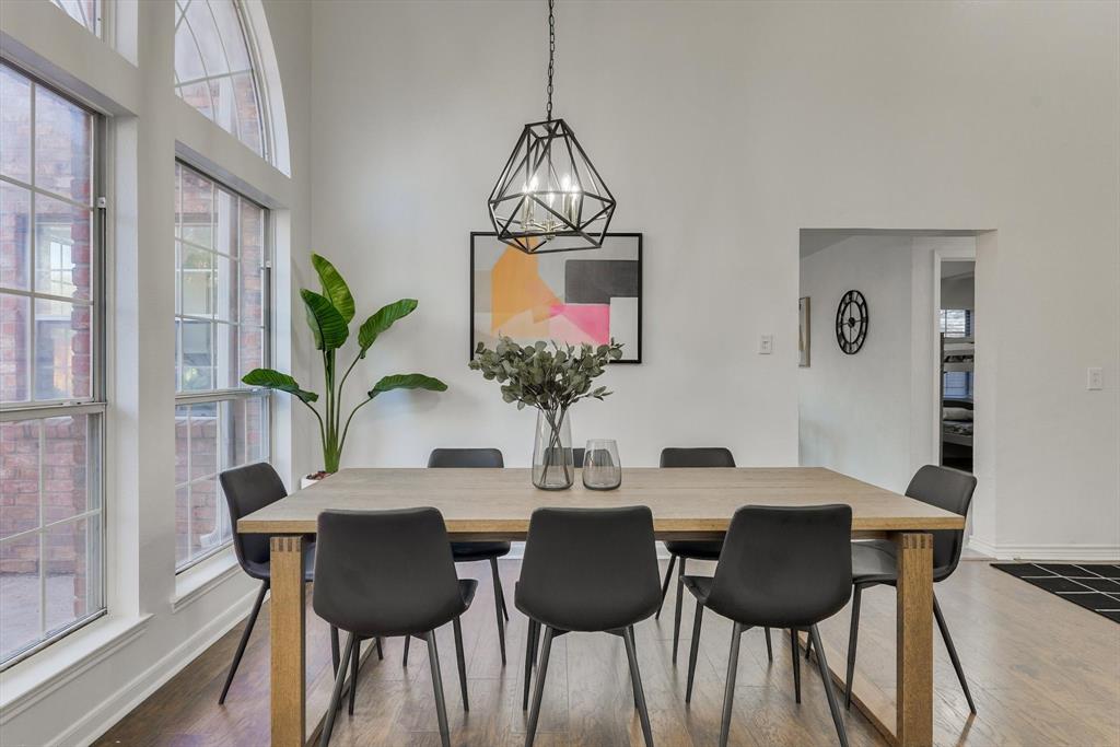 4402 Goodwin Drive Grand Prairie, TX 75052 - Photo 12 of 39 a dining room with furniture and wooden floor