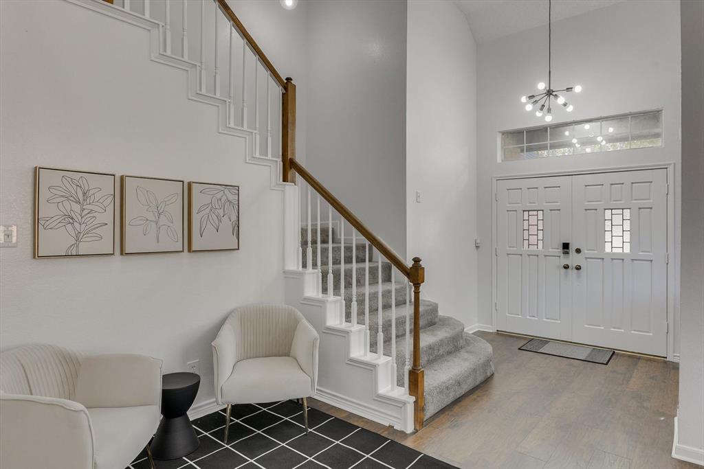 4402 Goodwin Drive Grand Prairie, TX 75052 - Photo 6 of 39 a view of hall way with furniture and stairs