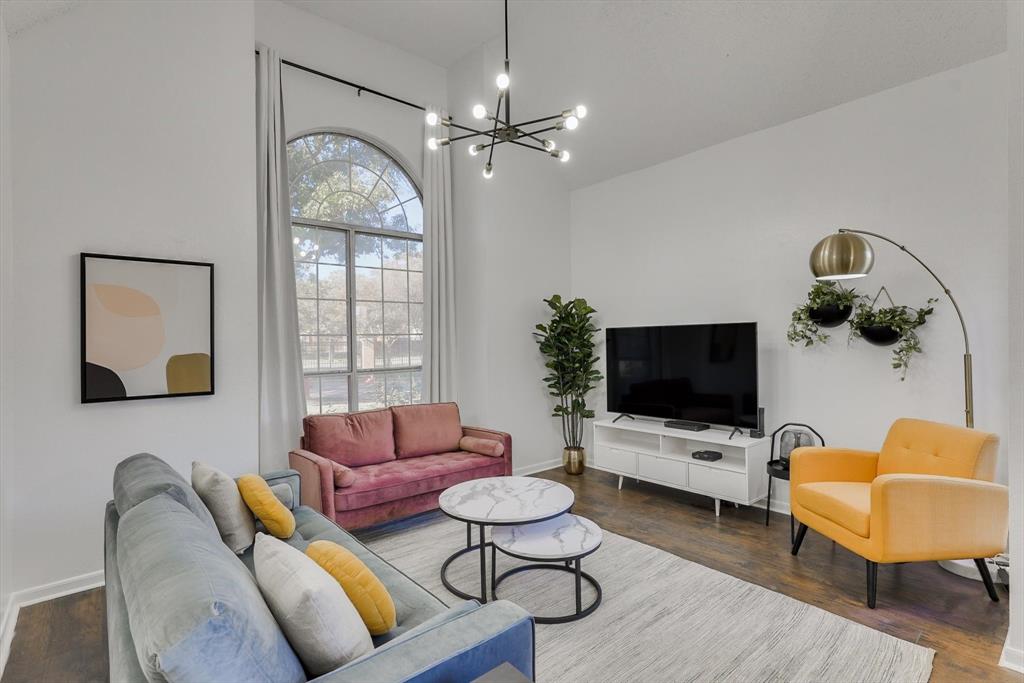4402 Goodwin Drive Grand Prairie, TX 75052 - Photo 8 of 39 a living room with furniture and wooden floor