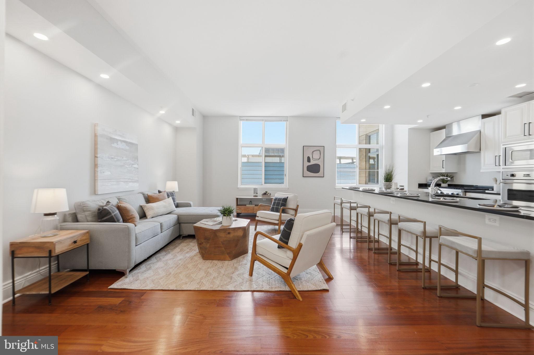 11990 Market Street, Unit 2103 Reston, VA 20190 - Photo 5 of 78 Bright and airy modern living space.