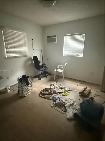 a room with furniture and a window