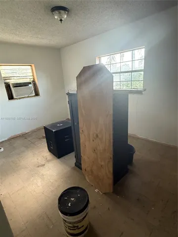 a bathroom with a toilet and a sink