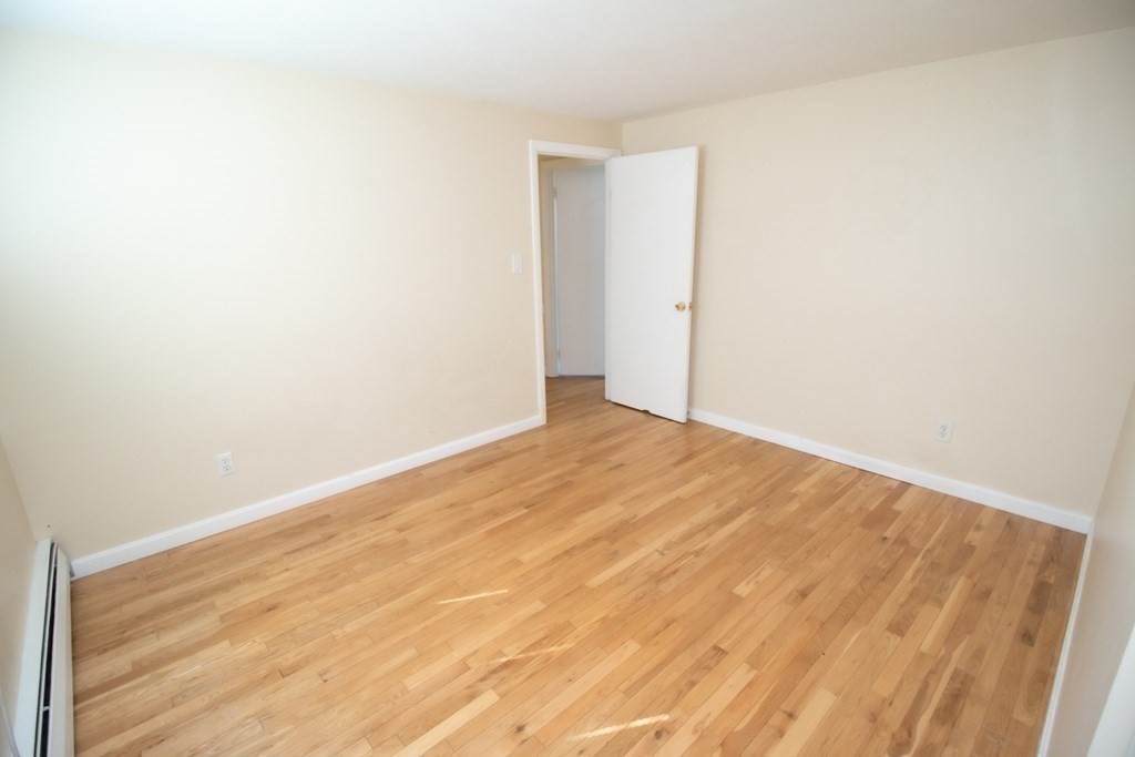 58 Bishop Drive, Unit 58 Framingham, MA 01702 - Photo 8 of 13 a view of empty room