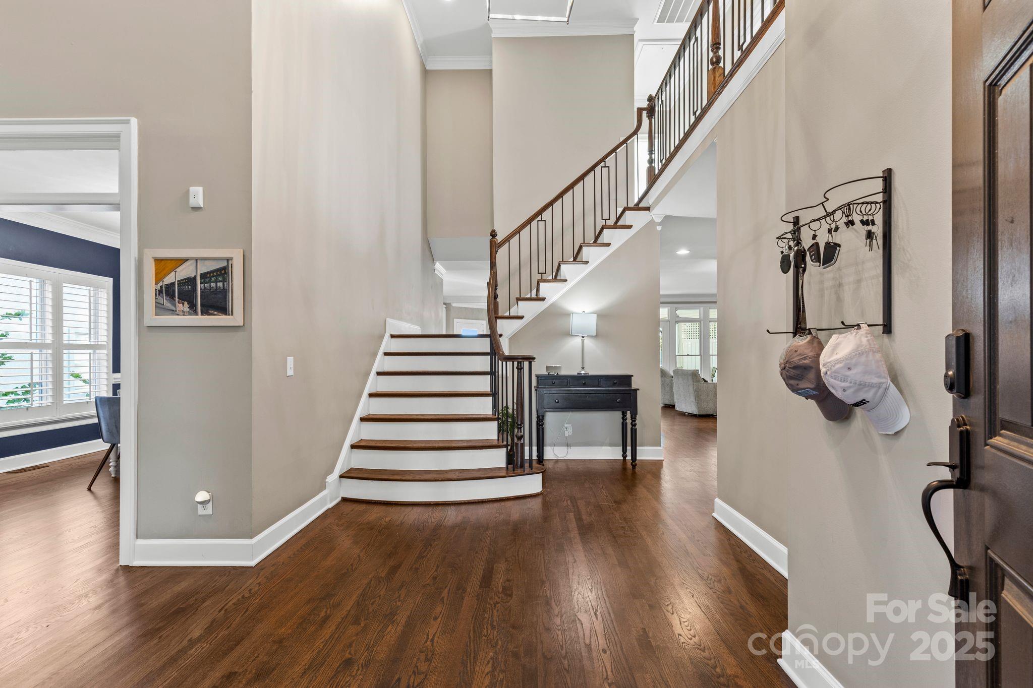 17701 Springwinds Drive Cornelius, NC 28031 - Photo 10 of 48 a view of entryway and hall with wooden floor