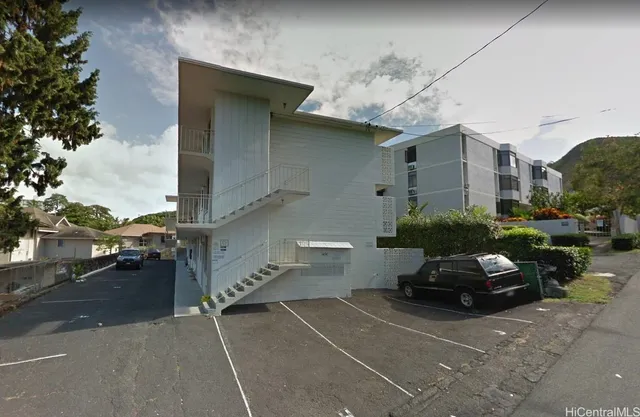 a car parked in front of a house