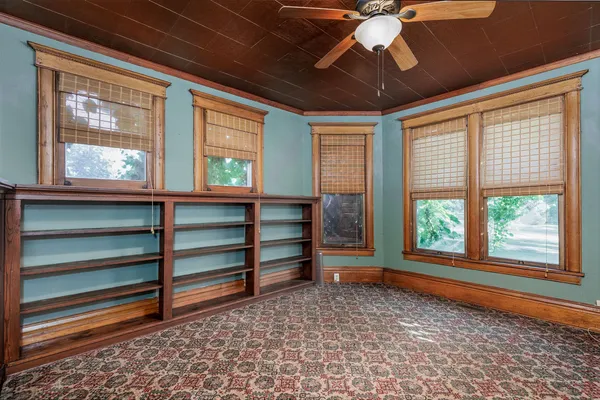 a view of a hallway with a livingroom