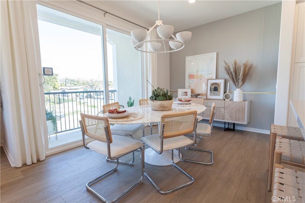 18646 Rorimer Street La Puente, CA 91744 - Photo 11 of 24 a living room with furniture a table and a large window