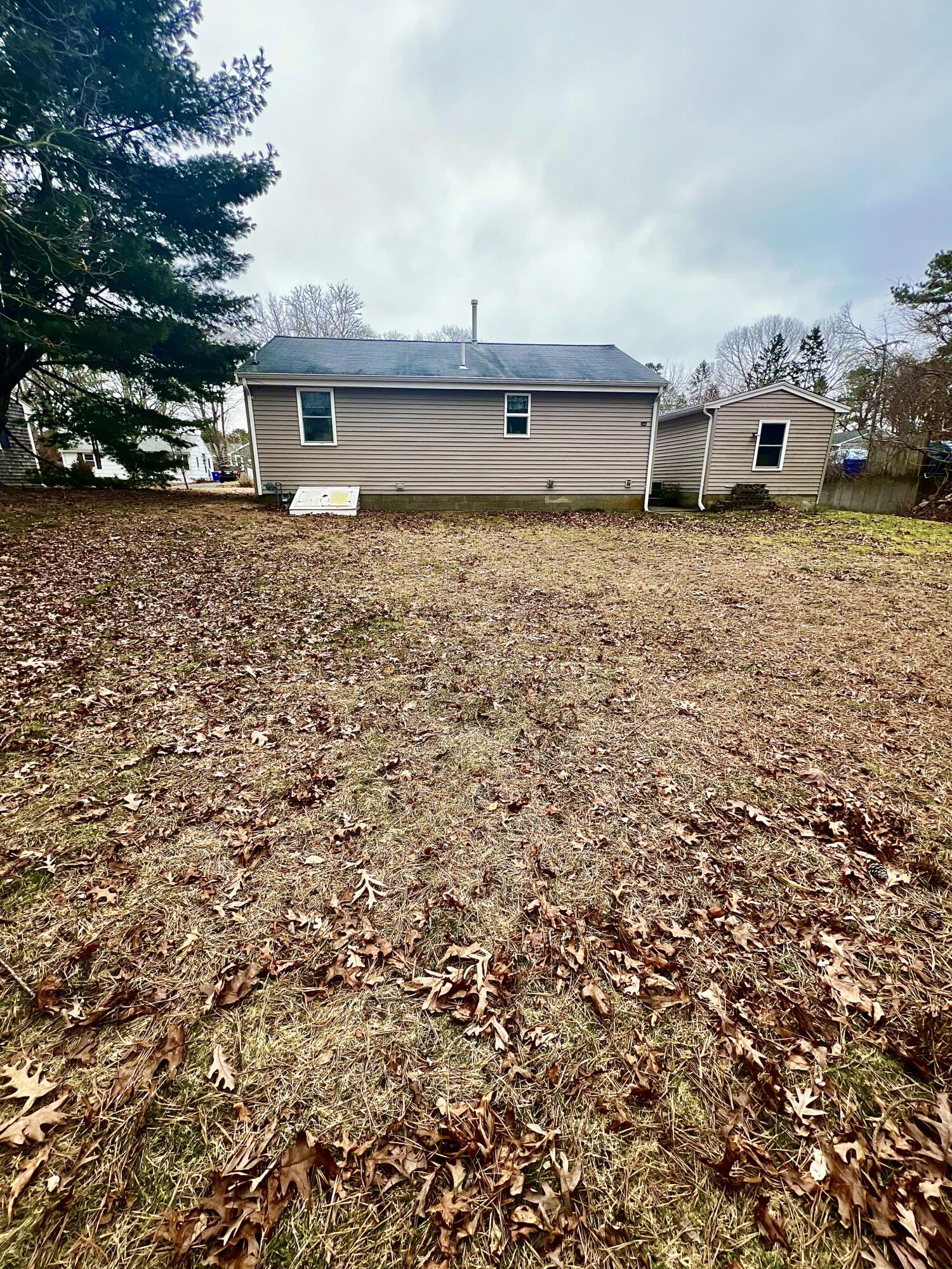 79 Handy Road Pocasset, MA 02559 - Photo 2 of 10 a view of a house with a outdoor space