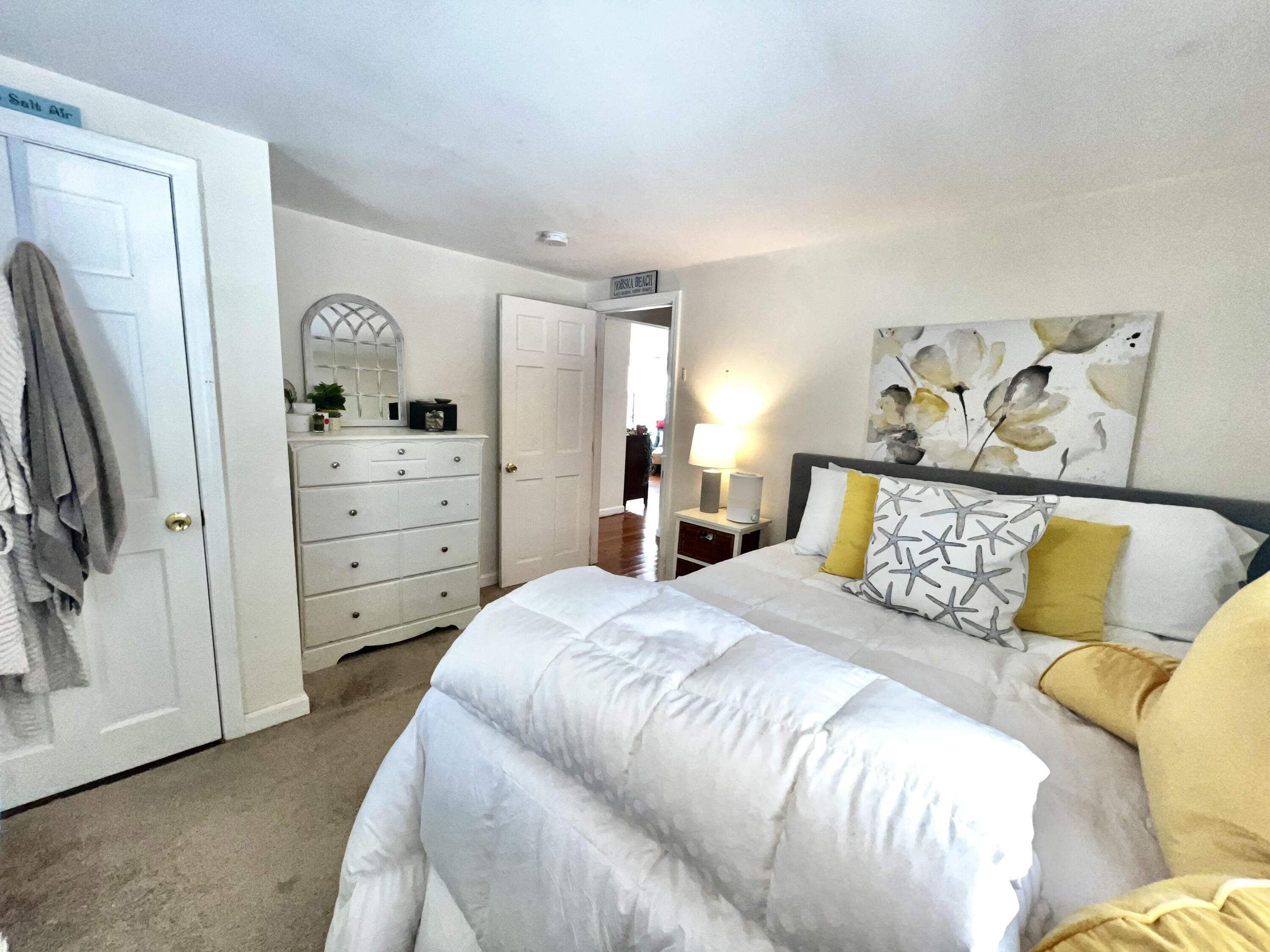 79 Handy Road Pocasset, MA 02559 - Photo 7 of 10 a bedroom with a bed and a window