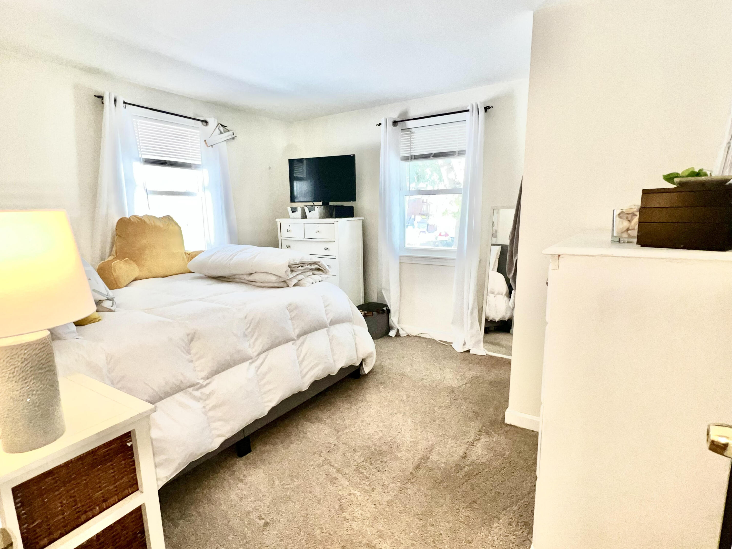 79 Handy Road Pocasset, MA 02559 - Photo 8 of 10 a bedroom with a bed and flat screen tv