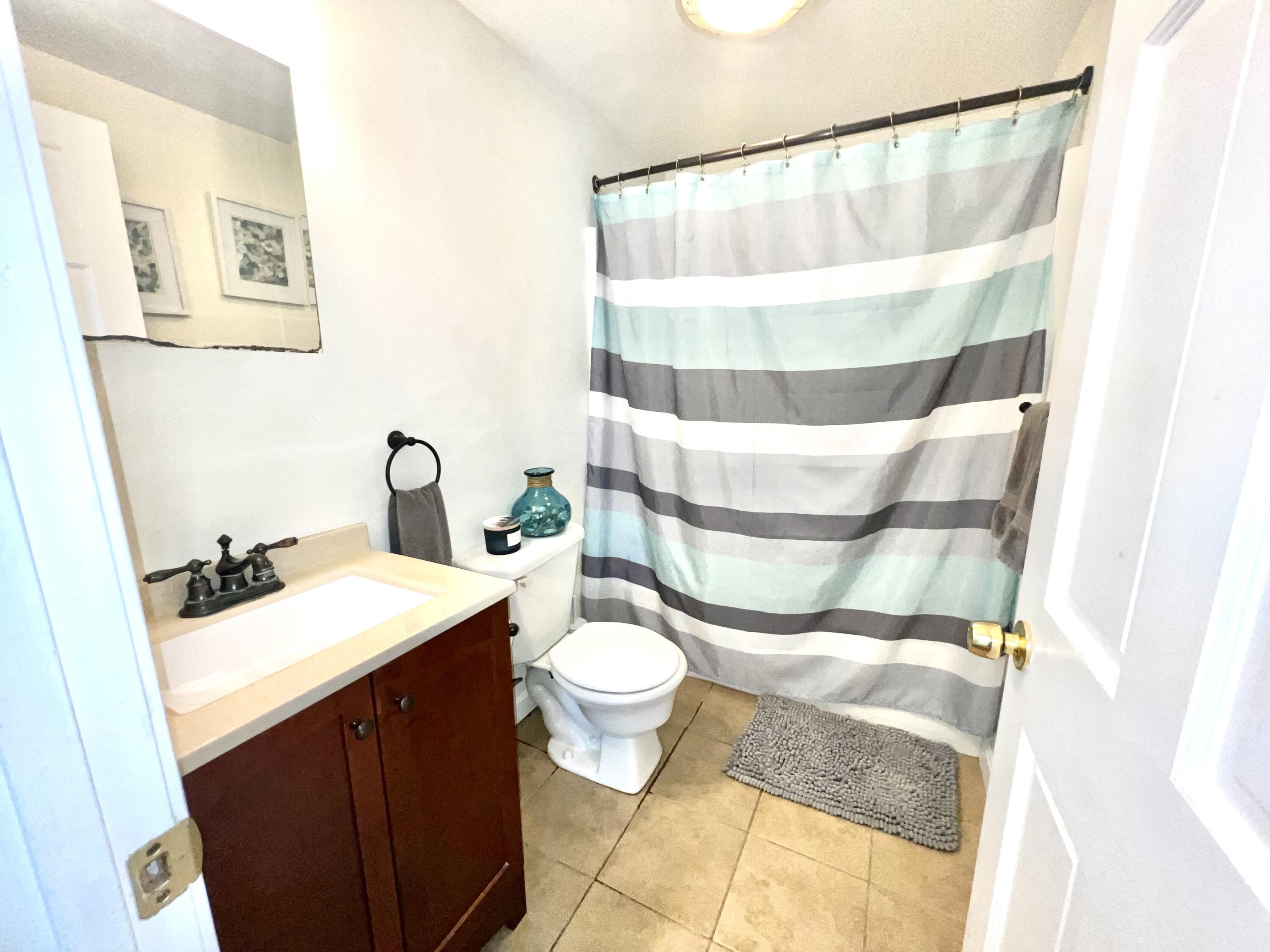 79 Handy Road Pocasset, MA 02559 - Photo 9 of 10 a bathroom with a sink and a mirror