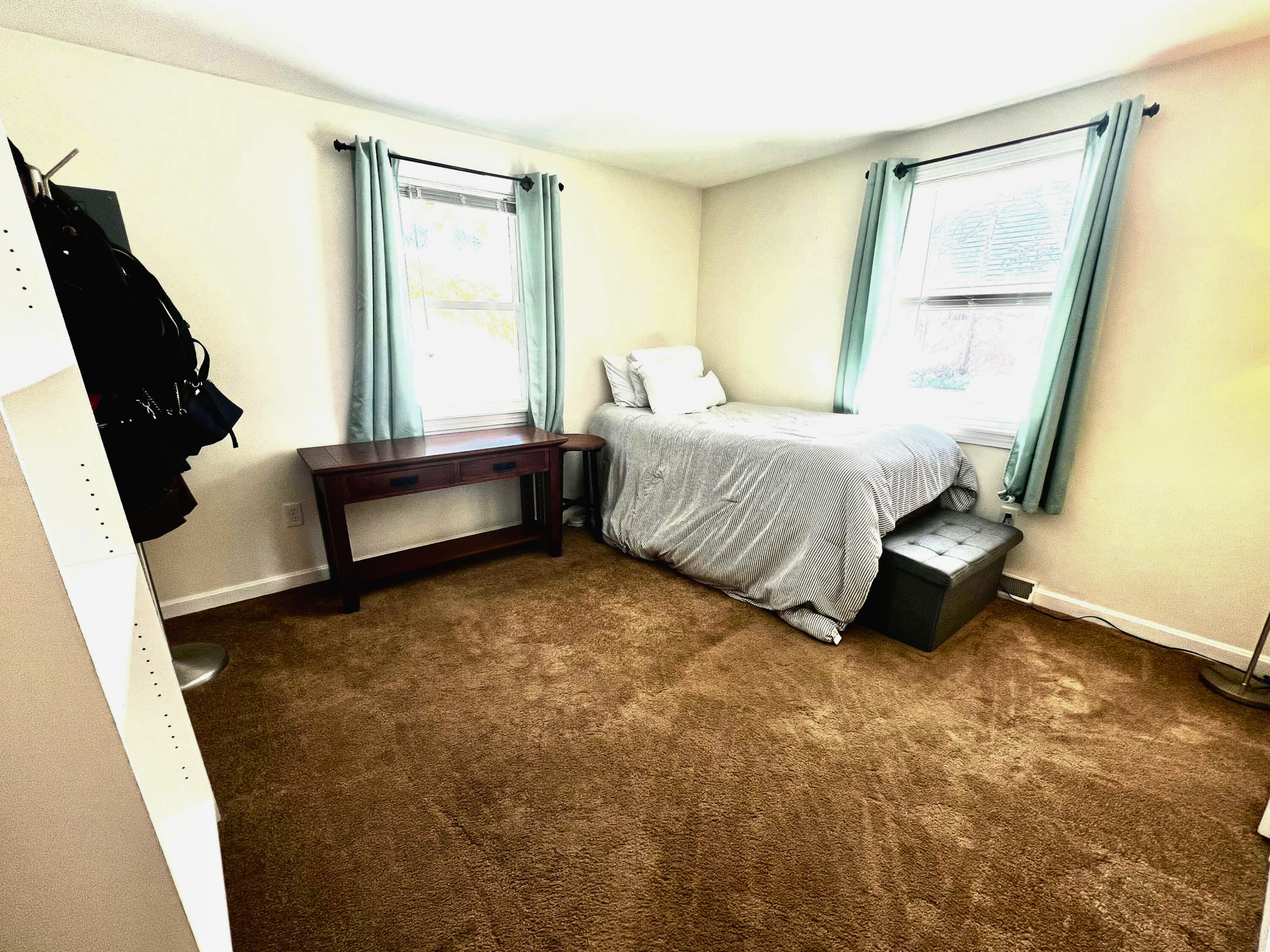 79 Handy Road Pocasset, MA 02559 - Photo 10 of 10 a spacious bedroom with a bed and a couch