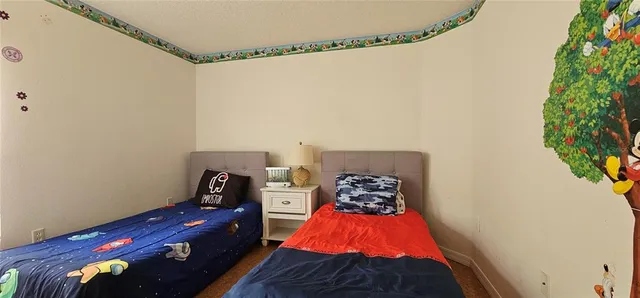 a view of a swimming pool with a yard