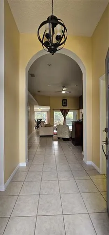 a view of a livingroom with furniture and white walls