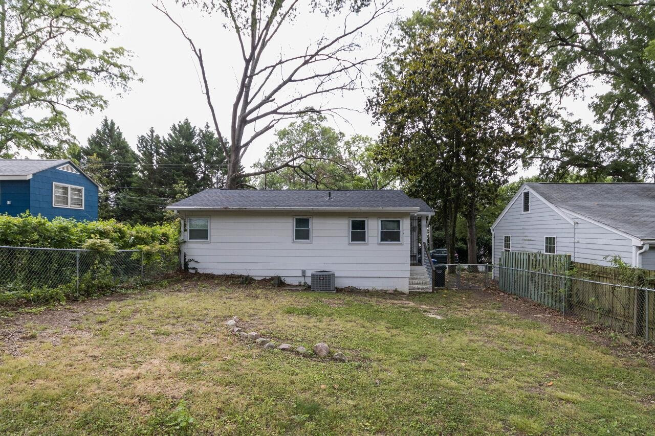 1415 Berkeley Street Durham, NC 27705 - Photo 21 of 24 a view of a house with a yard