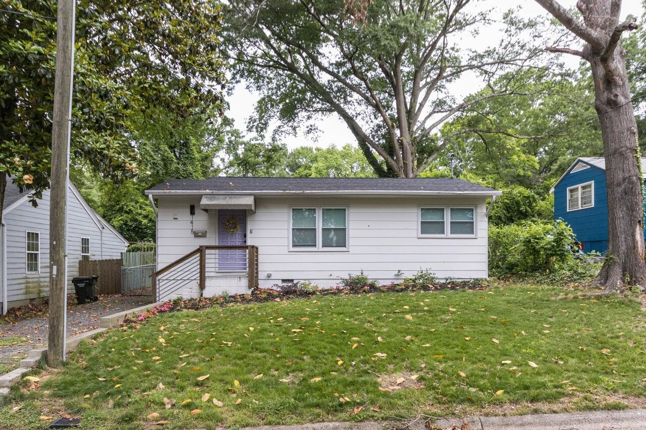 1415 Berkeley Street Durham, NC 27705 - Photo 23 of 24 a view of a house with a yard