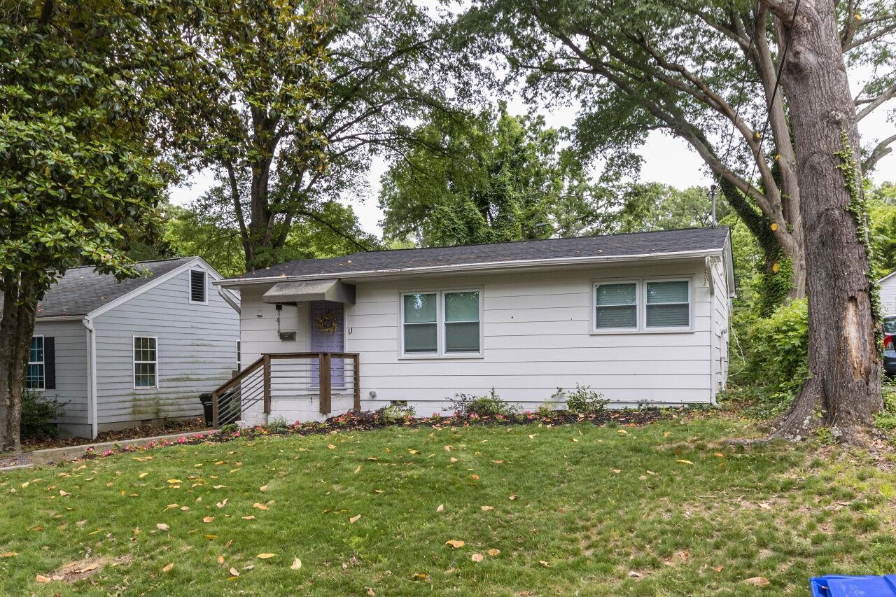 1415 Berkeley Street Durham, NC 27705 - Photo 24 of 24 a view of a house with a backyard