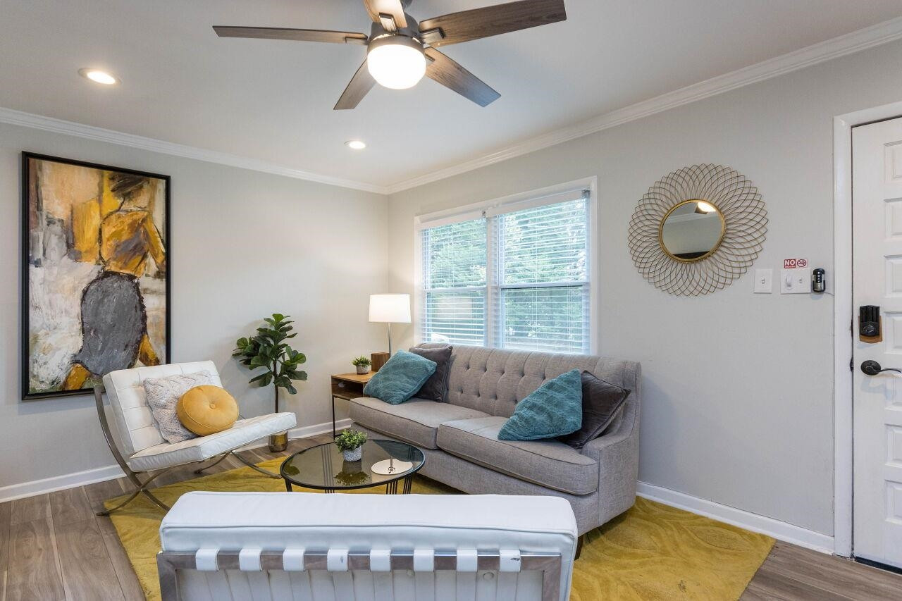 1415 Berkeley Street Durham, NC 27705 - Photo 4 of 24 a living room with furniture and a window