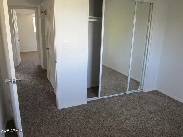 an empty room with closet