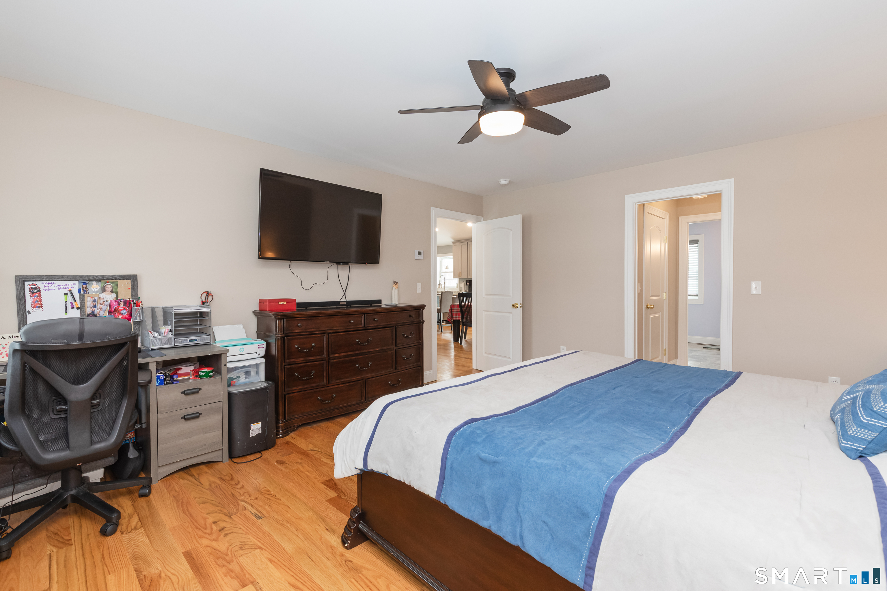 23 North Street Wolcott, CT 06716 - Photo 13 of 30 a bedroom with a bed and a flat screen tv