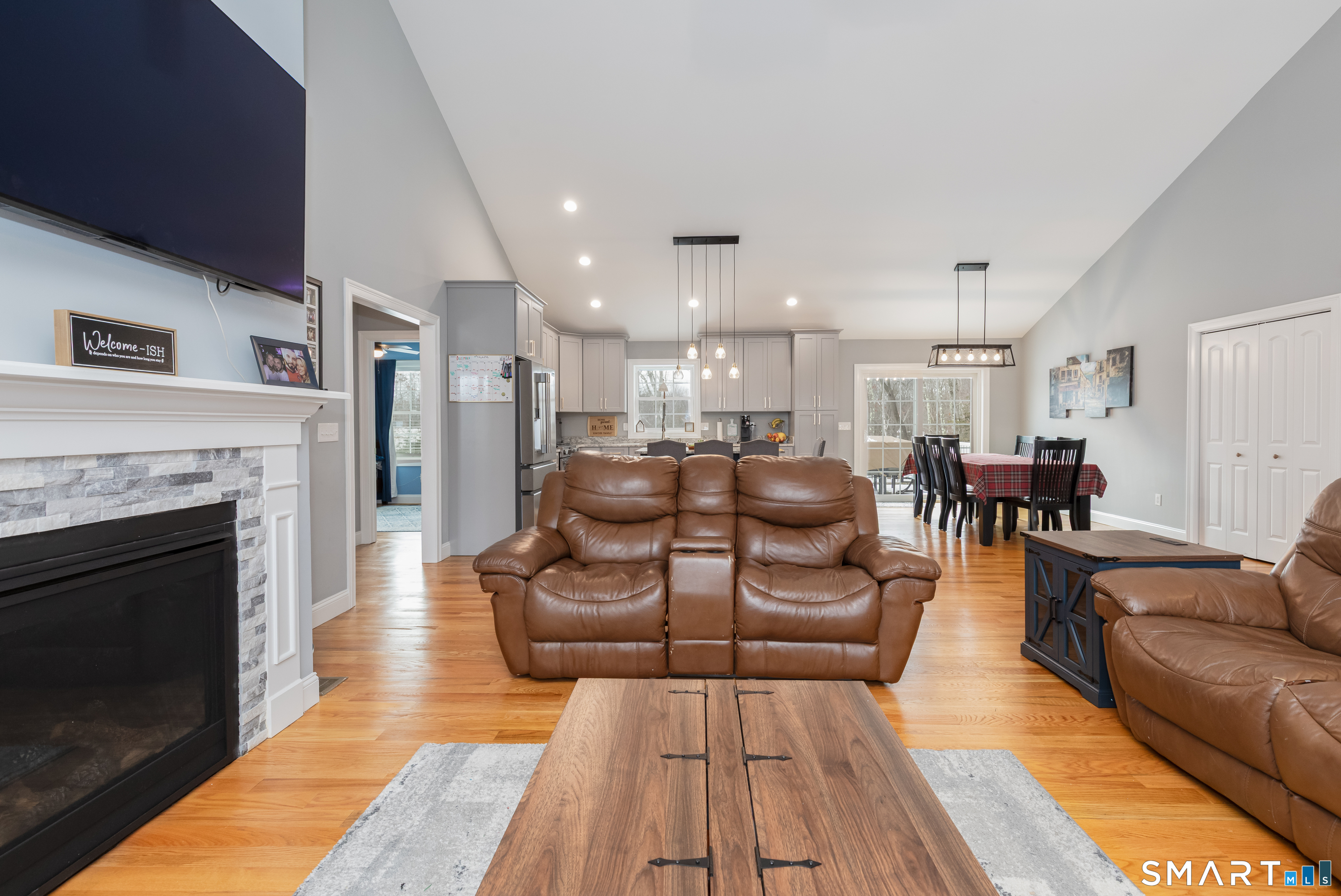 23 North Street Wolcott, CT 06716 - Photo 4 of 30 a living room with furniture and a fireplace