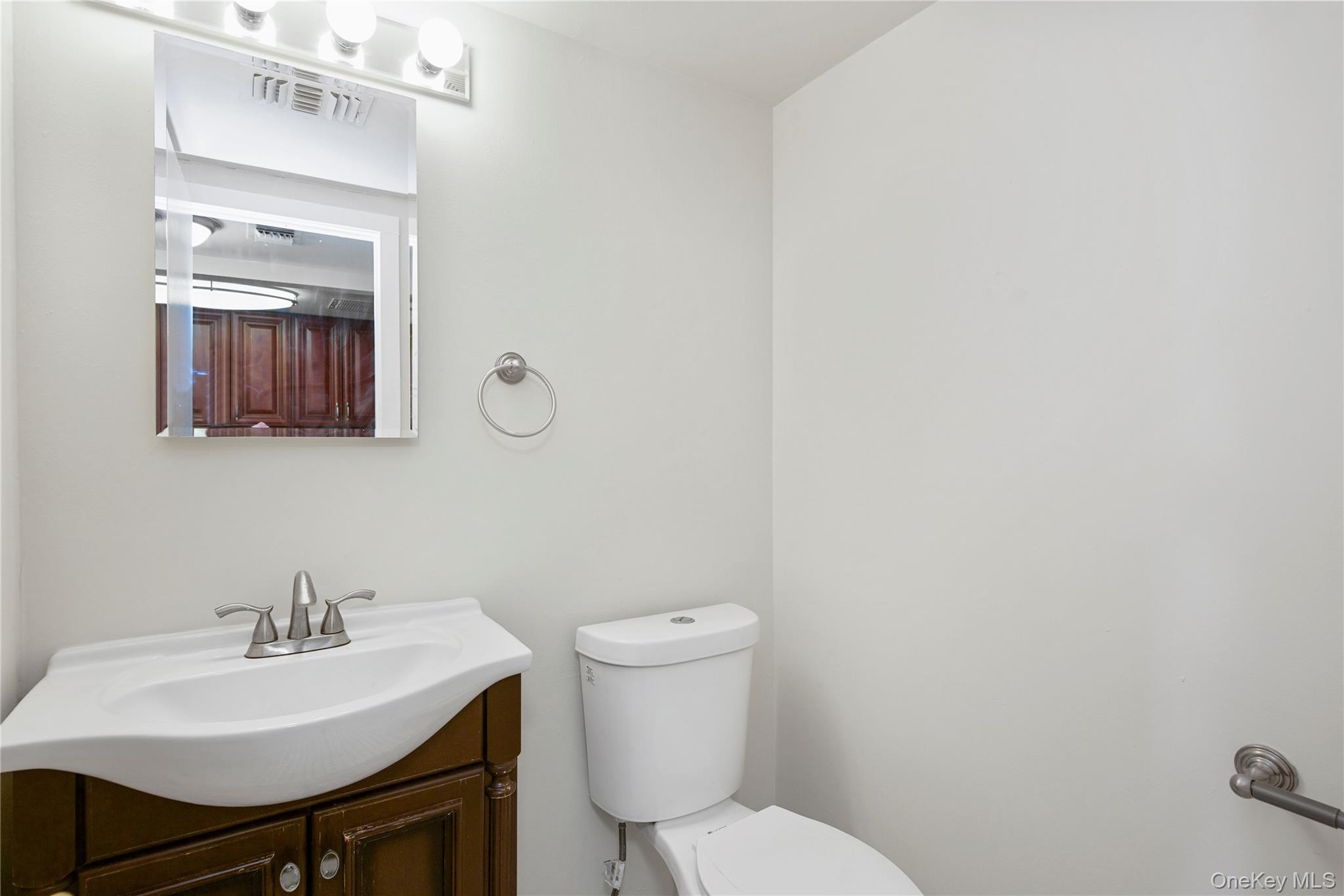 305 Chateau Rive, Unit 305 Peekskill, NY 10566 - Photo 14 of 22 Bathroom with vanity and toilet