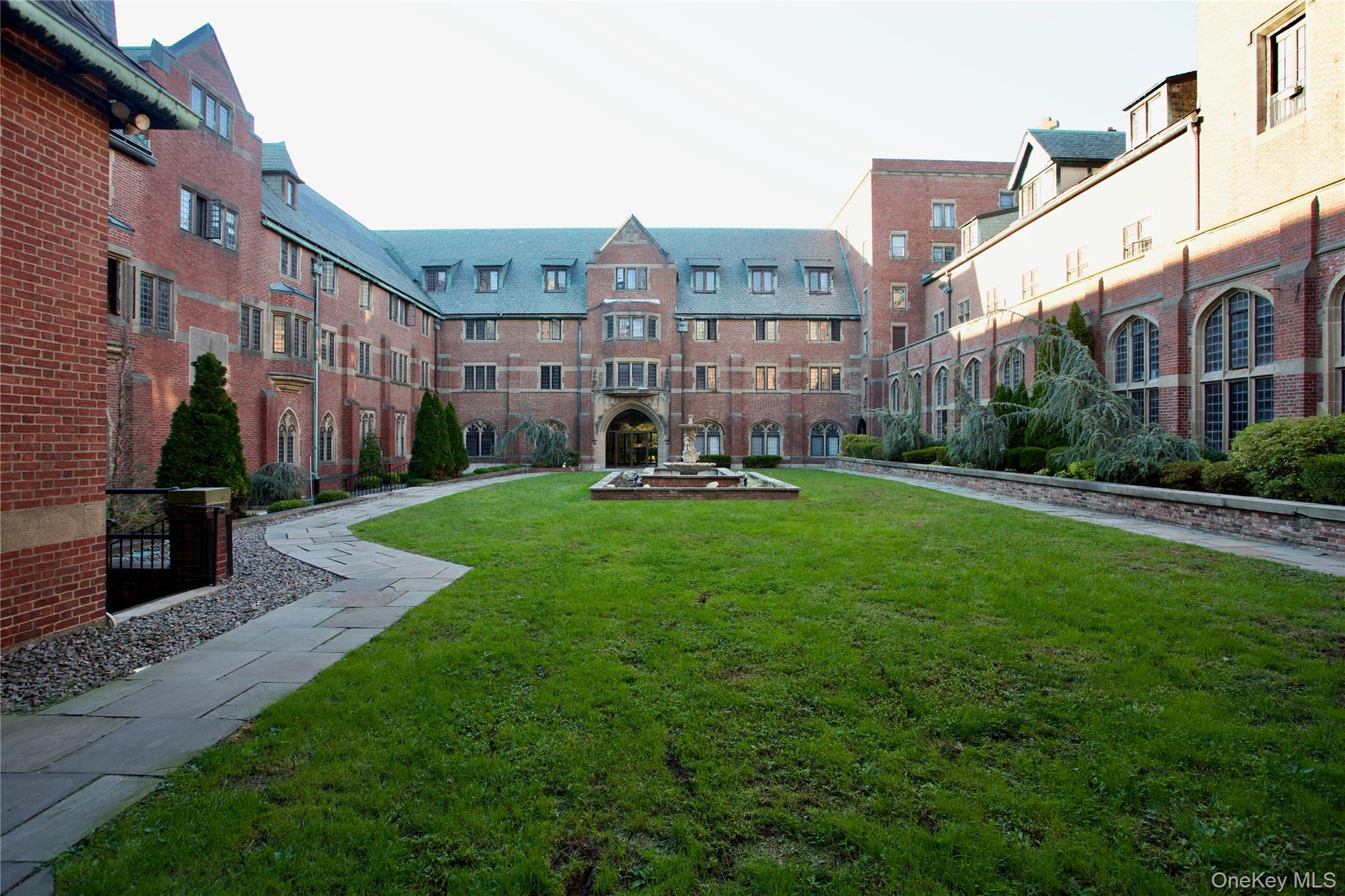 305 Chateau Rive, Unit 305 Peekskill, NY 10566 - Photo 19 of 22 View of community featuring a lawn