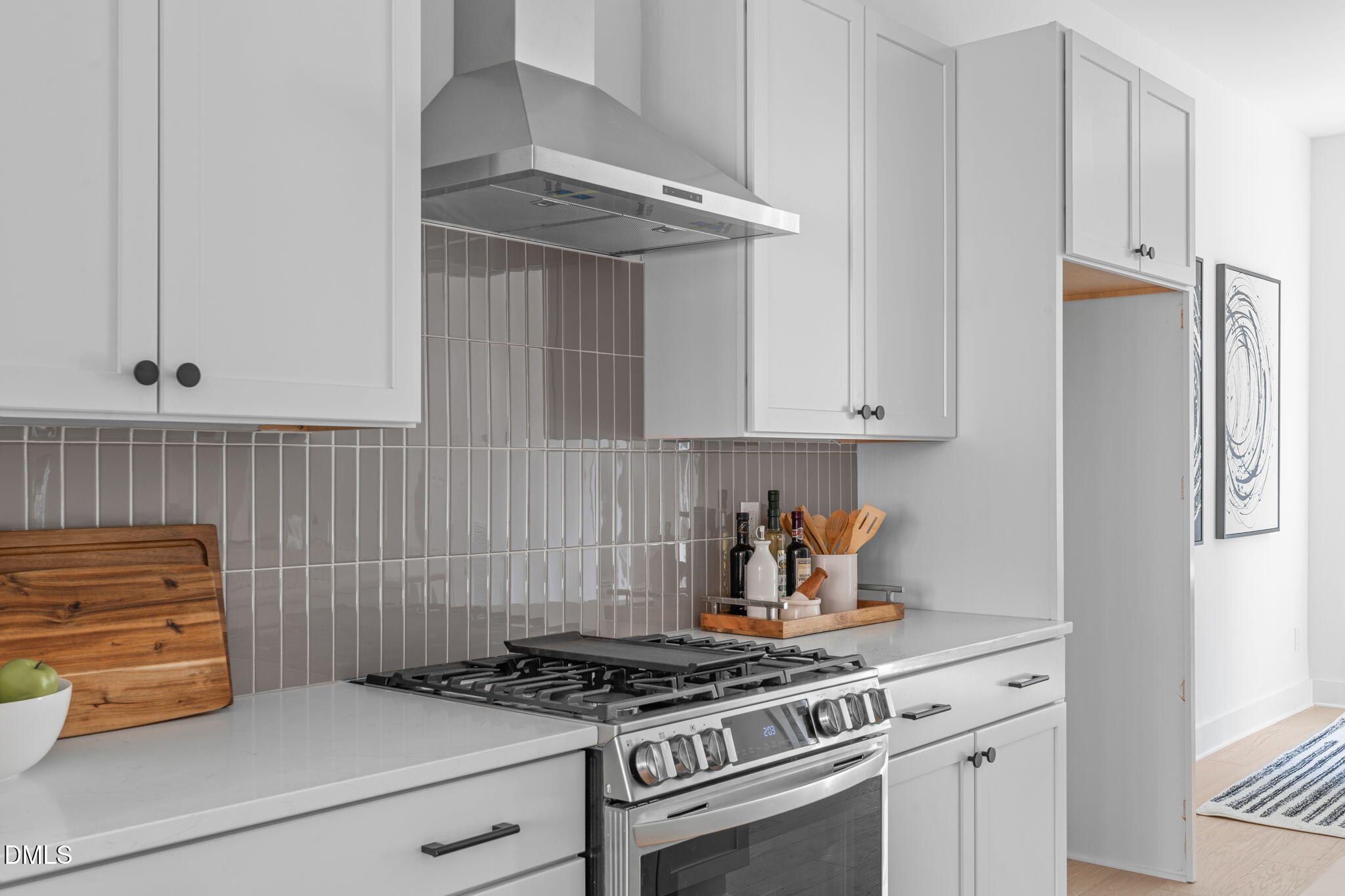 2004 Moody Durham, NC 27701 - Photo 6 of 43 a kitchen with stainless steel appliances granite countertop white cabinets and a stove