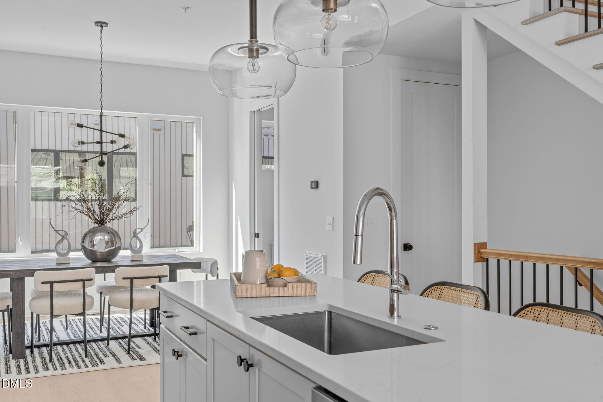 2004 Moody Durham, NC 27701 - Photo 7 of 43 a kitchen with stainless steel appliances a sink and a table with the chairs