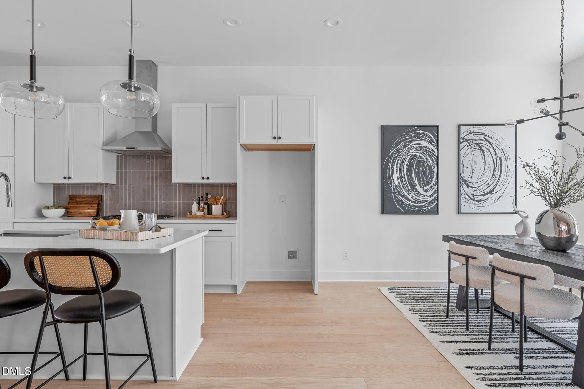 2004 Moody Durham, NC 27701 - Photo 8 of 43 a kitchen with stainless steel appliances granite countertop a sink a stove a refrigerator and island with wooden floor