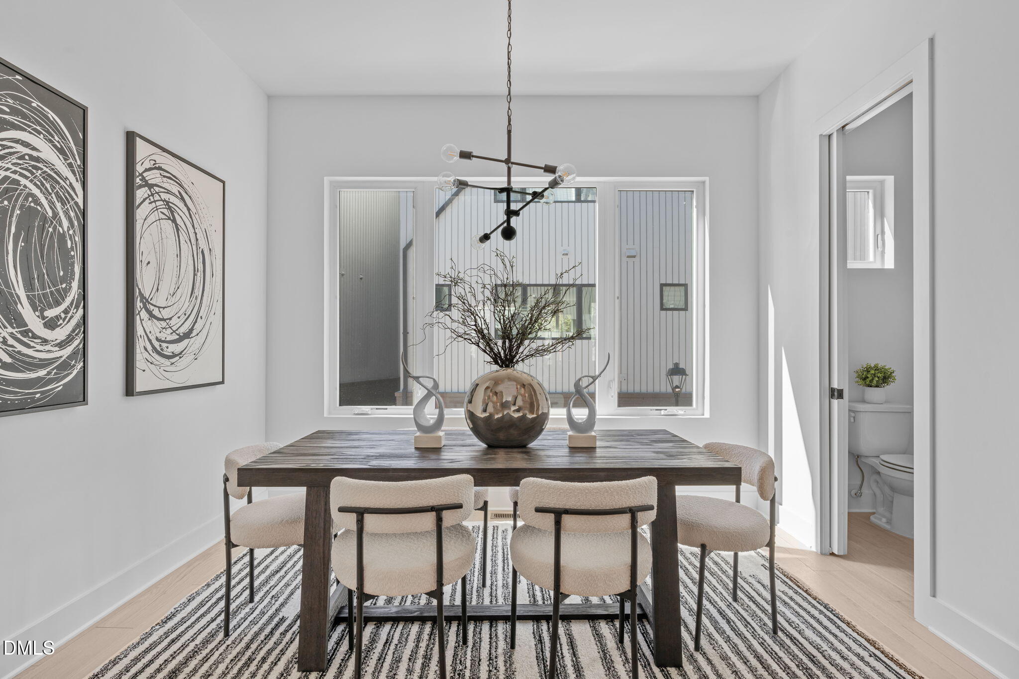 2004 Moody Durham, NC 27701 - Photo 10 of 43 a view of a dining room with furniture and wooden floor