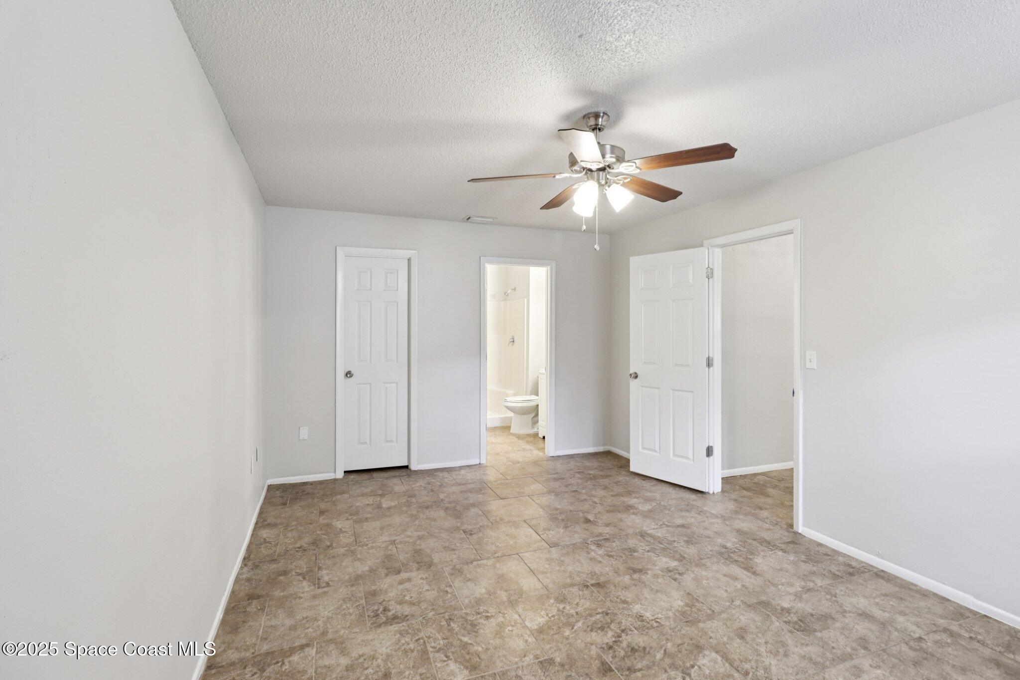 5215 Holden Road Cocoa, FL 32927 - Photo 21 of 34 a view of an empty room