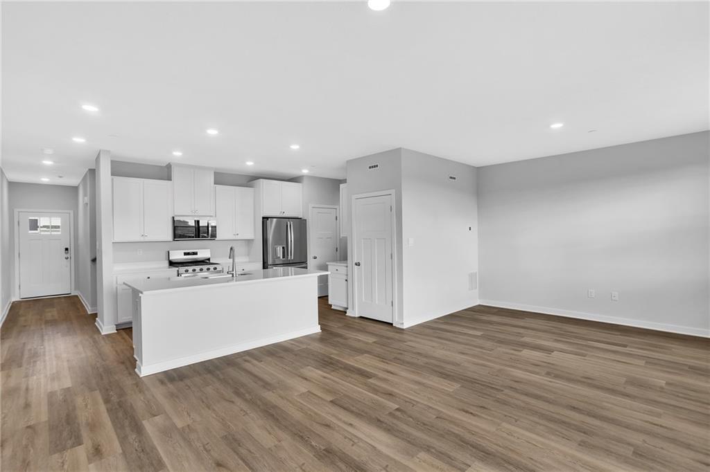 126 Scotland Lane Harmony, PA 16037 - Photo 11 of 43 a view of kitchen with wooden floor