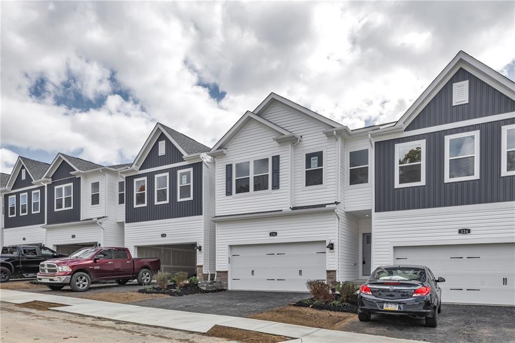 126 Scotland Lane Harmony, PA 16037 - Photo 2 of 43 a car parked in front of a house