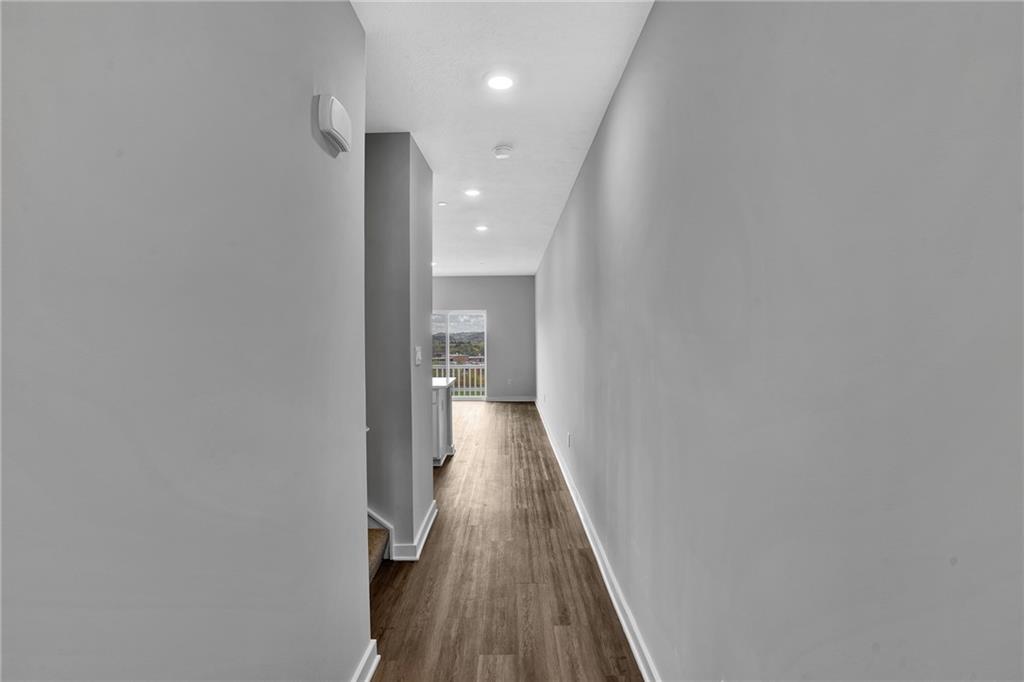 126 Scotland Lane Harmony, PA 16037 - Photo 3 of 43 a view of a hallway with wooden floor