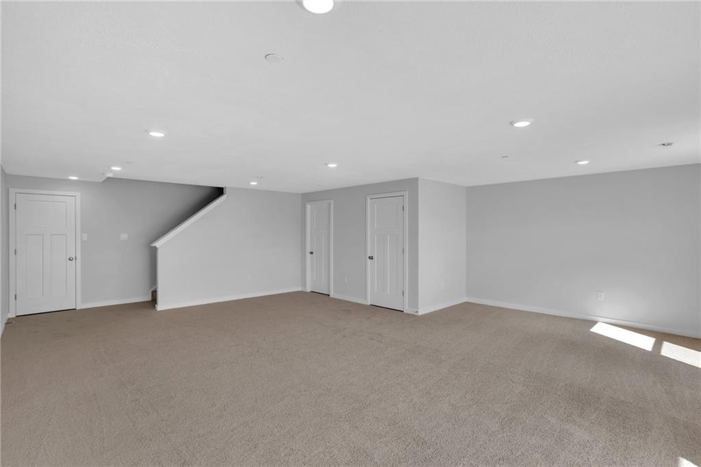 126 Scotland Lane Harmony, PA 16037 - Photo 32 of 43 a view of an empty room with a kitchen