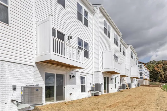 a view of a building with a street