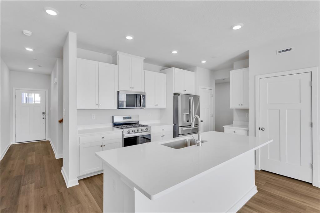 126 Scotland Lane Harmony, PA 16037 - Photo 7 of 43 a kitchen with stainless steel appliances a refrigerator sink and microwave
