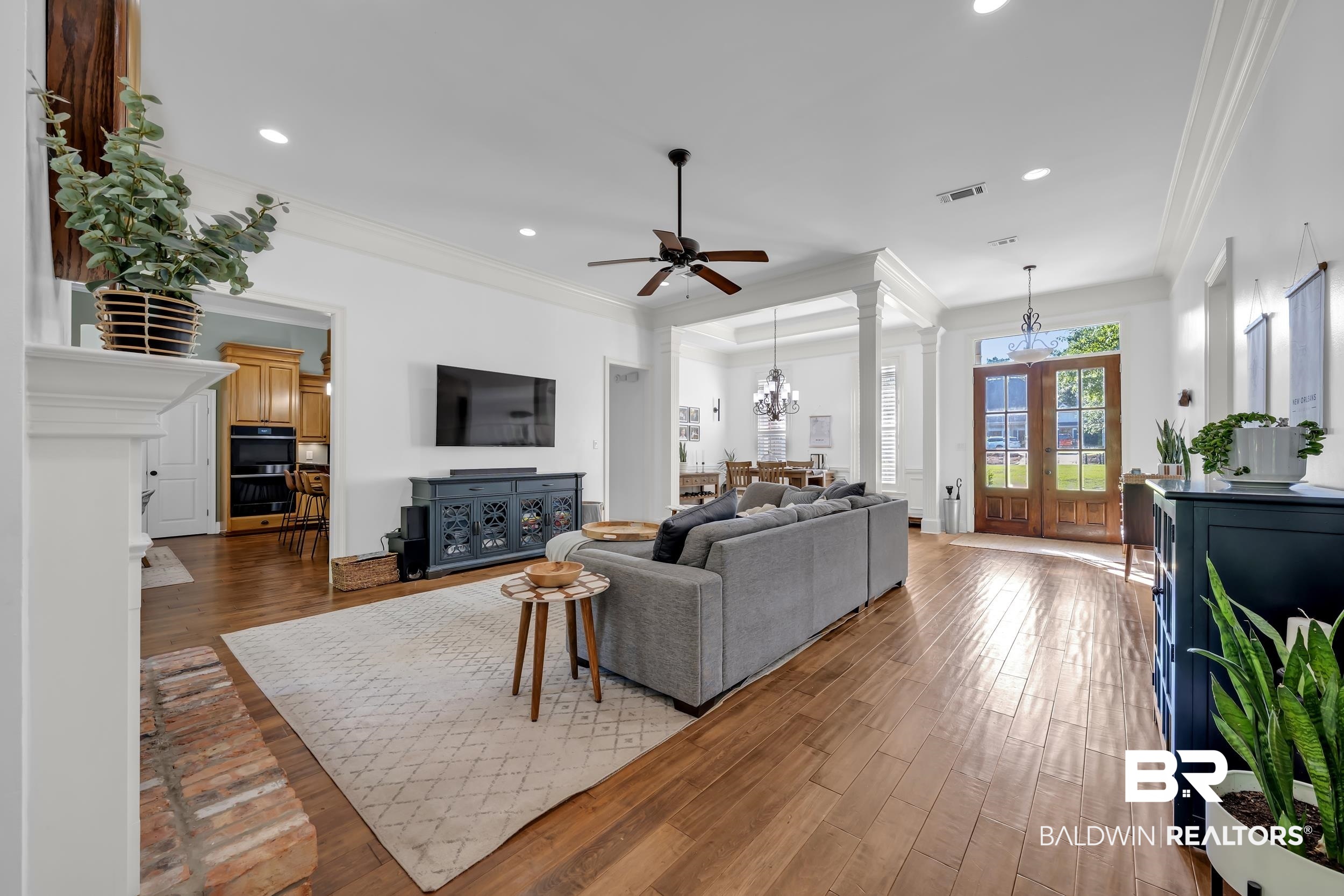 8137 Pine Run Daphne, AL 36527 - Photo 12 of 67 Expansive living area featuring wood-finish flooring, a ceiling fan, and recessed lighting