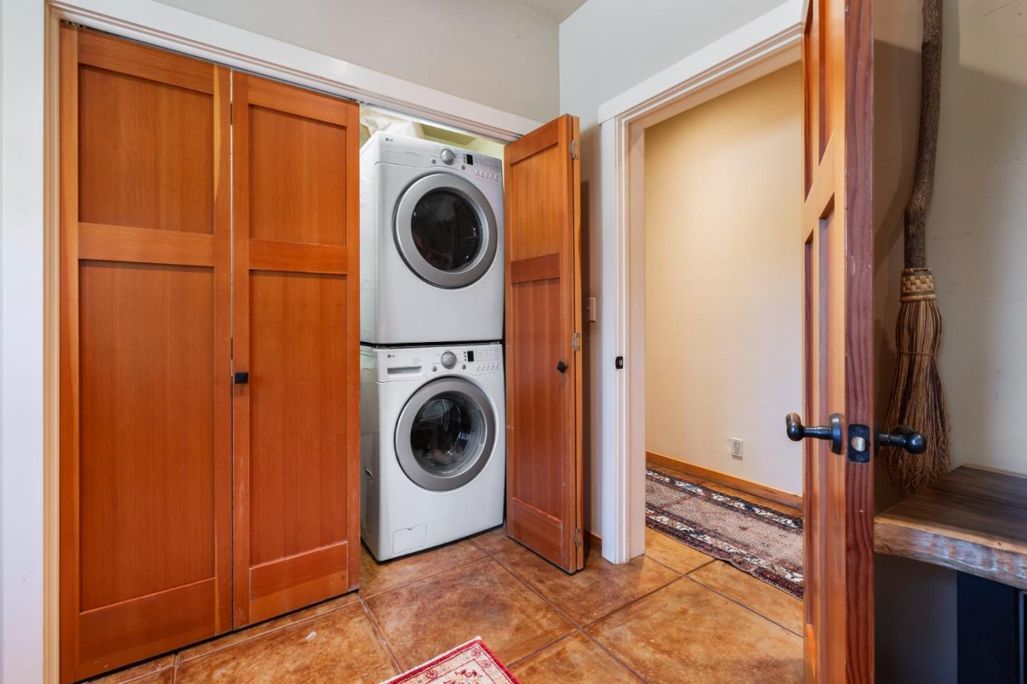 4710 North Rodeo Gulch Road Soquel, CA 95073 - Photo 21 of 97 a view of a storage & utility room with a washer and dryer