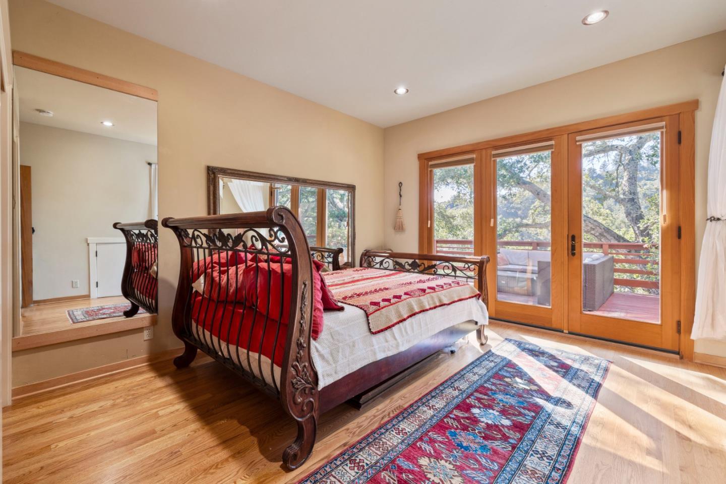 4710 North Rodeo Gulch Road Soquel, CA 95073 - Photo 22 of 97 a bedroom with a bed and a large window
