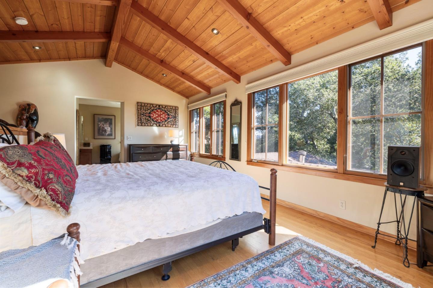 4710 North Rodeo Gulch Road Soquel, CA 95073 - Photo 24 of 97 a bed sitting in a spacious bedroom next to a window